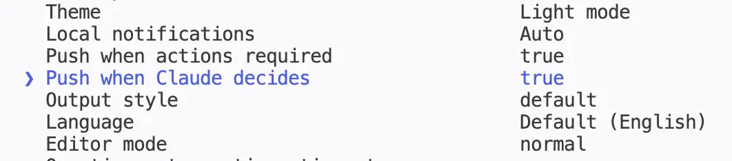 Claude Code /config settings list with both push notification toggles set to true.